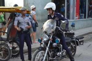 Click to see photos of police in Cuba